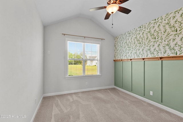 3068 Joe Stocks Rd, Greenville, NC 27858 - spare room with wallpapered walls, ceiling fan, carpet, vaulted ceiling, and baseboards