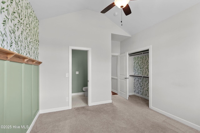3068 Joe Stocks Rd, Greenville, NC 27858 - unfurnished bedroom with carpet flooring, vaulted ceiling, ensuite bathroom, and baseboards