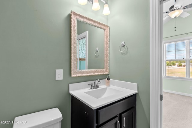 3068 Joe Stocks Rd, Greenville, NC 27858 - bathroom with vanity, toilet, ceiling fan, and baseboards