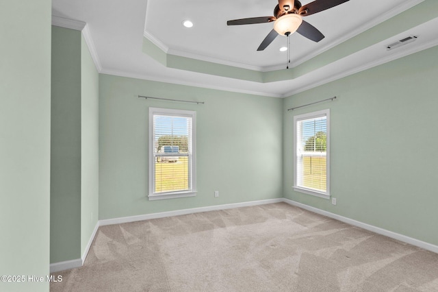 3068 Joe Stocks Rd, Greenville, NC 27858 - carpeted empty room with healthy amount of natural light, ornamental molding, a tray ceiling, baseboards, and ceiling fan