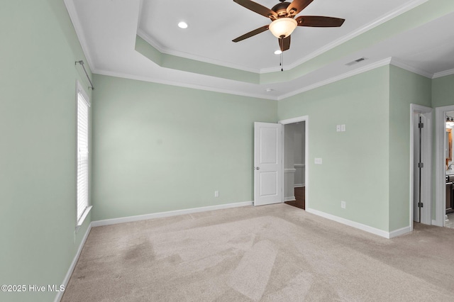 3068 Joe Stocks Rd, Greenville, NC 27858 - unfurnished bedroom with carpet flooring, crown molding, baseboards, recessed lighting, and a tray ceiling