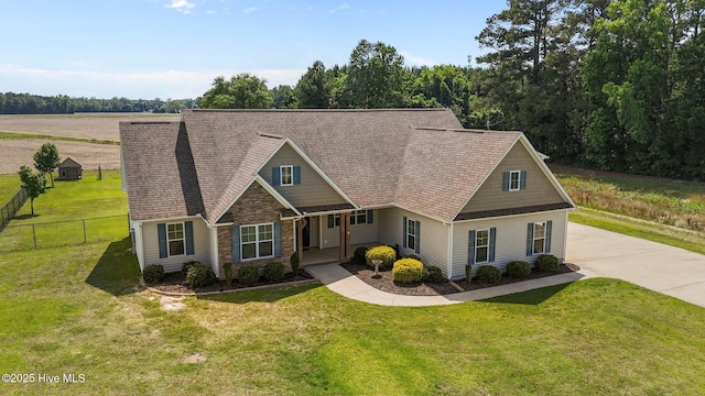 3068 Joe Stocks Rd, Greenville, NC 27858 - view of front facade featuring concrete driveway and stone siding