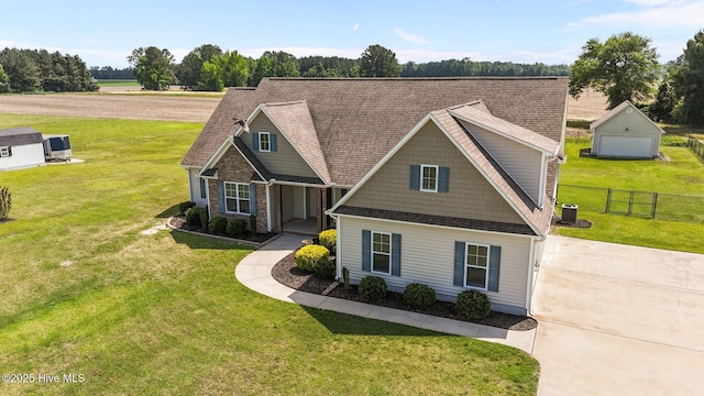 3068 Joe Stocks Rd, Greenville, NC 27858 - view of front of home with central AC, concrete driveway, and a shingled roof