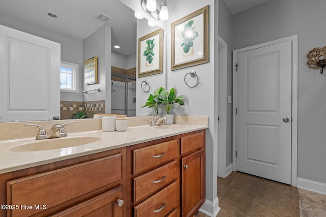 456 N Prince Henry Way, Cameron, NC 28326 - bathroom featuring double vanity, a stall shower, tile patterned flooring, and baseboards