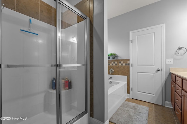 456 N Prince Henry Way, Cameron, NC 28326 - full bathroom with vanity, a garden tub, a shower stall, and tile patterned floors