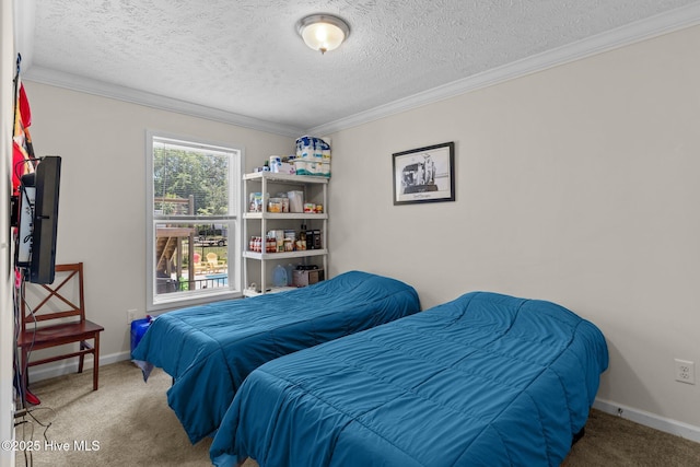 233 NE 70th St, Oak Island, NC 28465 - bedroom featuring carpet floors, a textured ceiling, ornamental molding, and baseboards