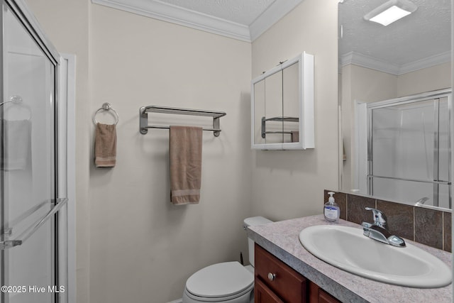 233 NE 70th St, Oak Island, NC 28465 - bathroom featuring a shower stall, vanity, a textured ceiling, toilet, and ornamental molding