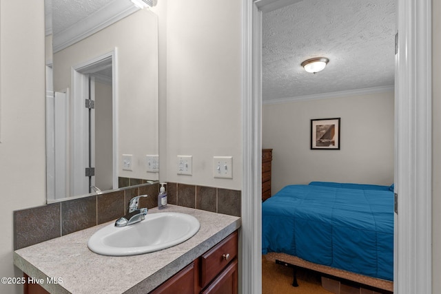 233 NE 70th St, Oak Island, NC 28465 - bathroom featuring a textured ceiling, vanity, and crown molding