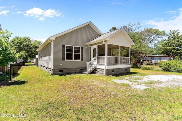 233 NE 70th St, Oak Island, NC 28465 - rear view of house with crawl space and covered porch