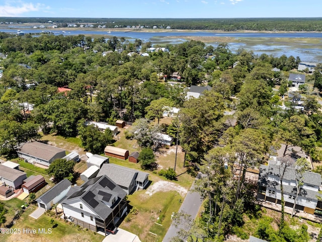 233 NE 70th St, Oak Island, NC 28465 - aerial perspective of suburban area featuring a large body of water