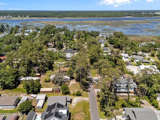 233 NE 70th St, Oak Island, NC 28465 - aerial perspective of suburban area with a large body of water