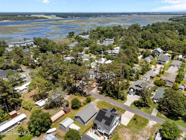 233 NE 70th St, Oak Island, NC 28465 - aerial perspective of suburban area featuring a large body of water