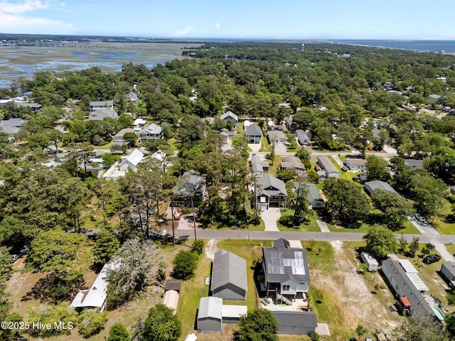 233 NE 70th St, Oak Island, NC 28465 - aerial perspective of suburban area featuring a large body of water