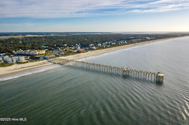 233 NE 70th St, Oak Island, NC 28465 - bird's eye view of waterfront with a beach