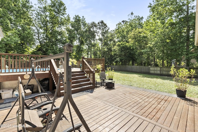 130 Combine Ln, Leland, NC 28451 - deck featuring stairway and view of wooded area