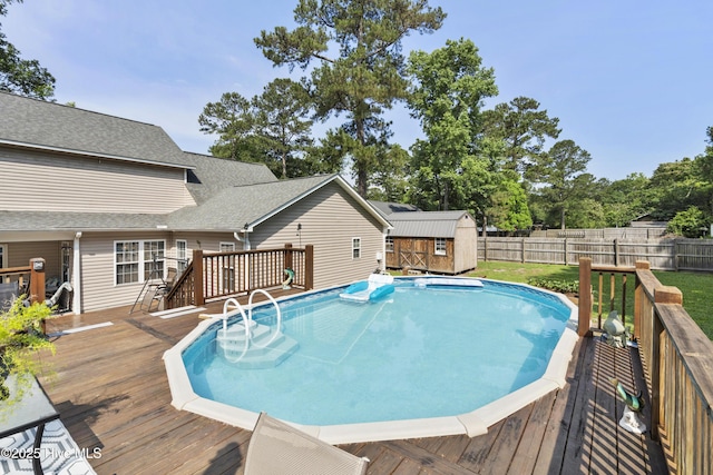 130 Combine Ln, Leland, NC 28451 - view of swimming pool featuring a fenced backyard and a deck