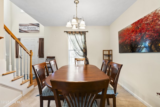 130 Combine Ln, Leland, NC 28451 - dining area with light carpet, a chandelier, stairway, and baseboards