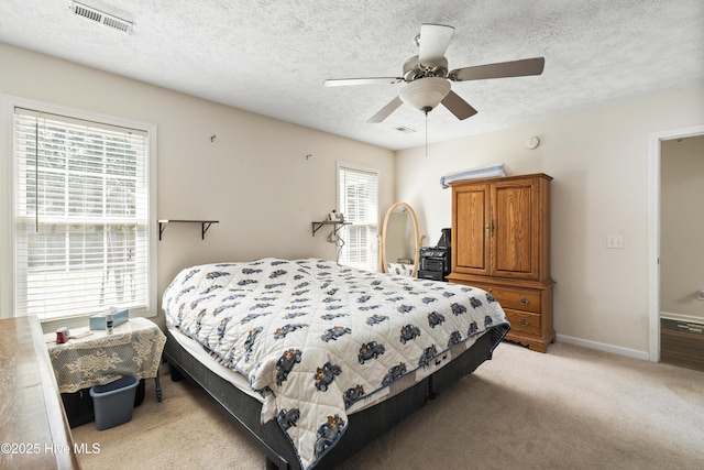 130 Combine Ln, Leland, NC 28451 - bedroom with light carpet, a textured ceiling, ceiling fan, and baseboards