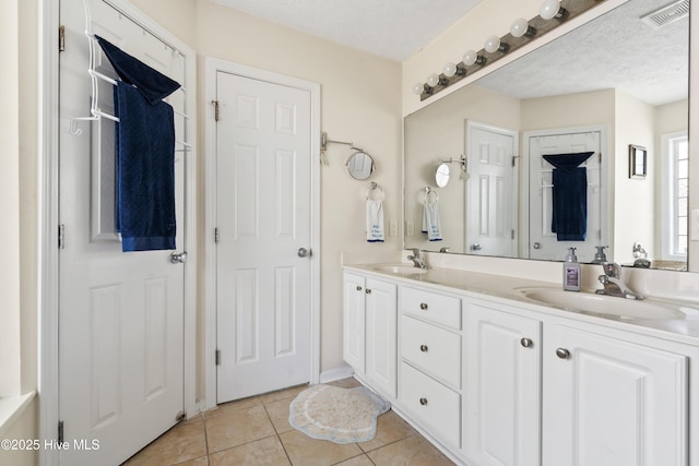130 Combine Ln, Leland, NC 28451 - bathroom featuring double vanity and tile patterned floors