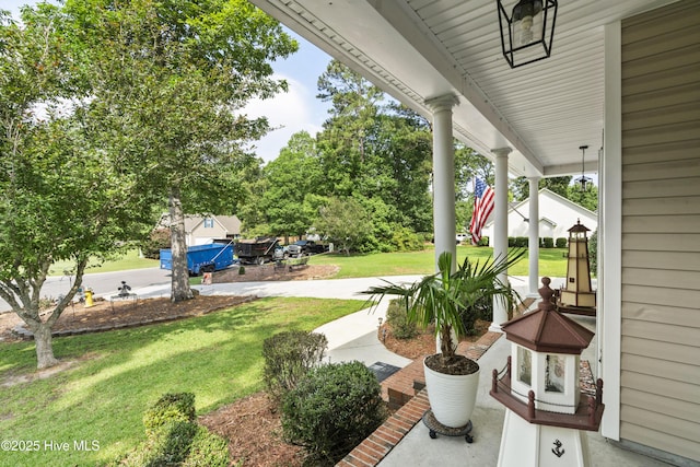 130 Combine Ln, Leland, NC 28451 - view of grassy yard with covered porch