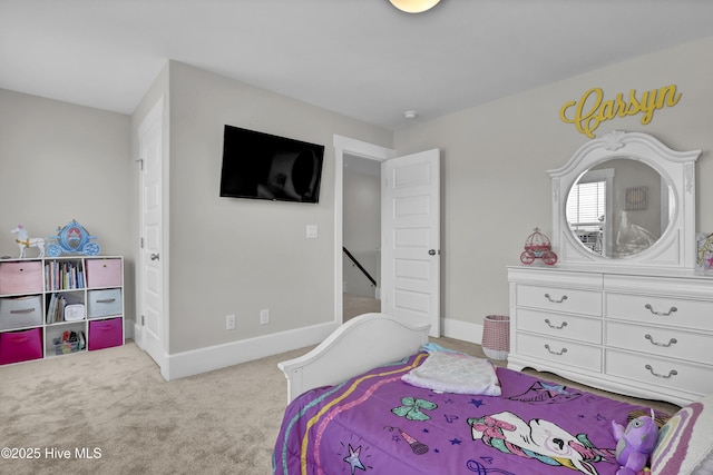 557 Moss Lake Ln, Holly Ridge, NC 28445 - carpeted bedroom with baseboards