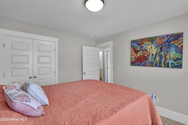 557 Moss Lake Ln, Holly Ridge, NC 28445 - carpeted bedroom with a closet and baseboards