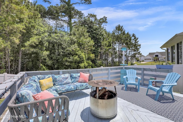 557 Moss Lake Ln, Holly Ridge, NC 28445 - deck with an outdoor hangout area