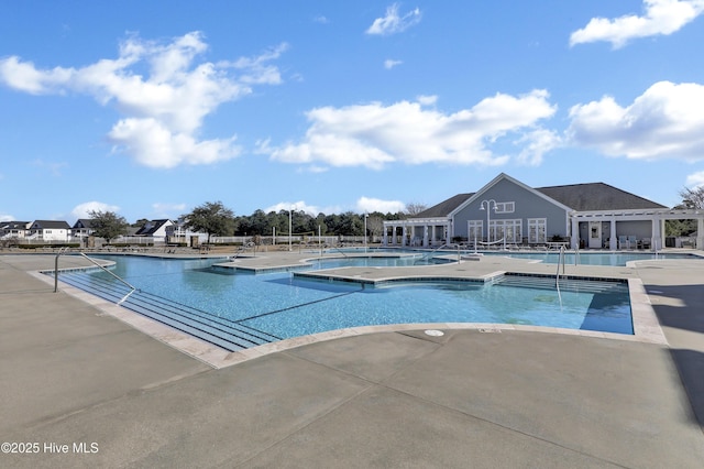 557 Moss Lake Ln, Holly Ridge, NC 28445 - community pool featuring a patio area and a hot tub
