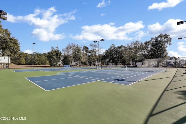 557 Moss Lake Ln, Holly Ridge, NC 28445 - view of tennis court featuring community basketball court