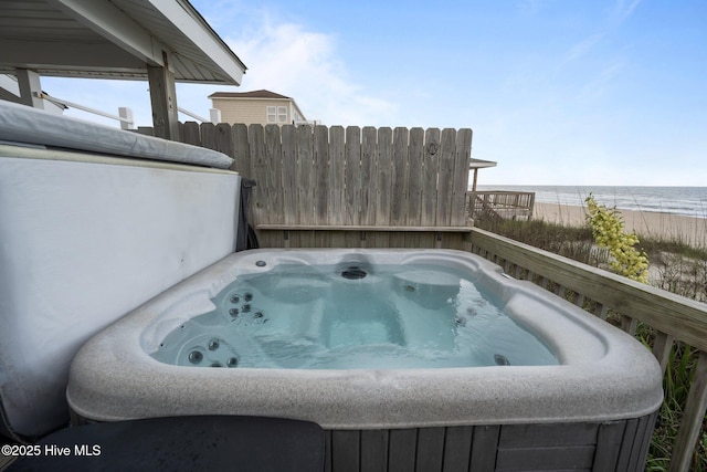 232 Seashore Dr, North Topsail Beach, NC 28460 - view of swimming pool with view of water and beach and a hot tub