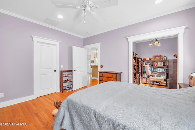2013 Adams St, Wilmington, NC 28401 - bedroom with wood finished floors, ornamental molding, recessed lighting, ceiling fan, and baseboards
