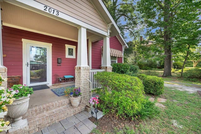 2013 Adams St, Wilmington, NC 28401 - property entrance featuring a porch