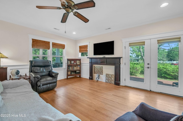 2013 Adams St, Wilmington, NC 28401 - living room featuring wood finished floors, french doors, a ceiling fan, and recessed lighting