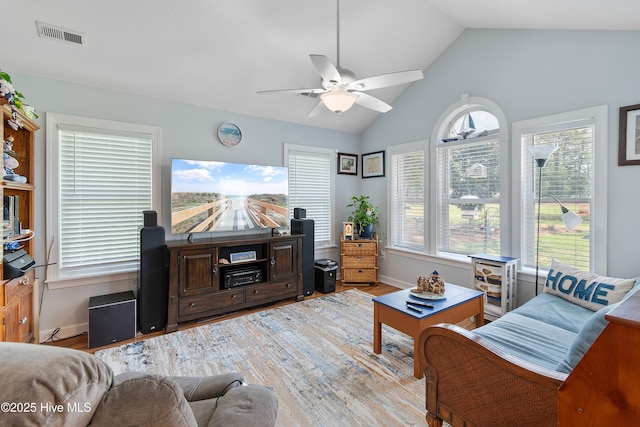 4 Golf Crest Ct, Carolina Shores, NC 28467 - living room with a ceiling fan, wood finished floors, lofted ceiling, and baseboards