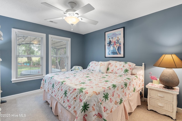 4 Golf Crest Ct, Carolina Shores, NC 28467 - carpeted bedroom featuring baseboards and a ceiling fan