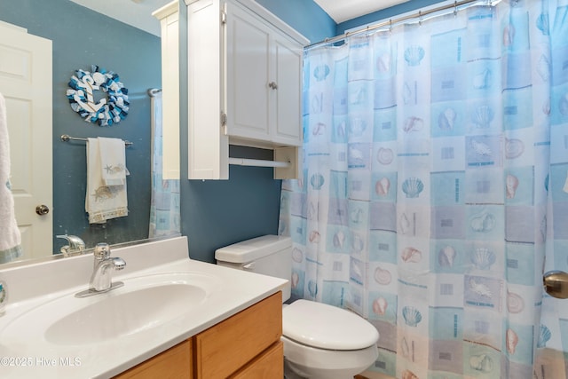 4 Golf Crest Ct, Carolina Shores, NC 28467 - bathroom featuring toilet, vanity, and curtained shower
