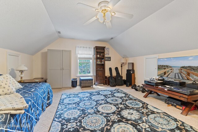 4 Golf Crest Ct, Carolina Shores, NC 28467 - bedroom with light carpet, vaulted ceiling, and a ceiling fan