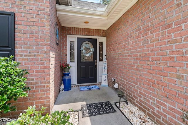 4 Golf Crest Ct, Carolina Shores, NC 28467 - property entrance featuring brick siding