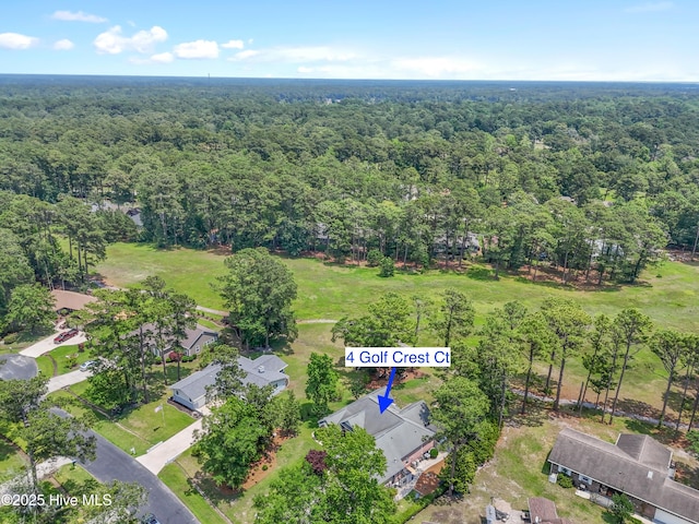 4 Golf Crest Ct, Carolina Shores, NC 28467 - view of property location with a forest
