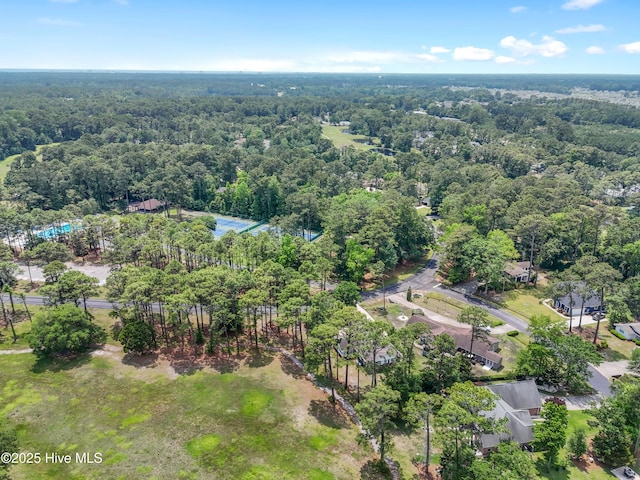 4 Golf Crest Ct, Carolina Shores, NC 28467 - aerial view of property's location with a forest