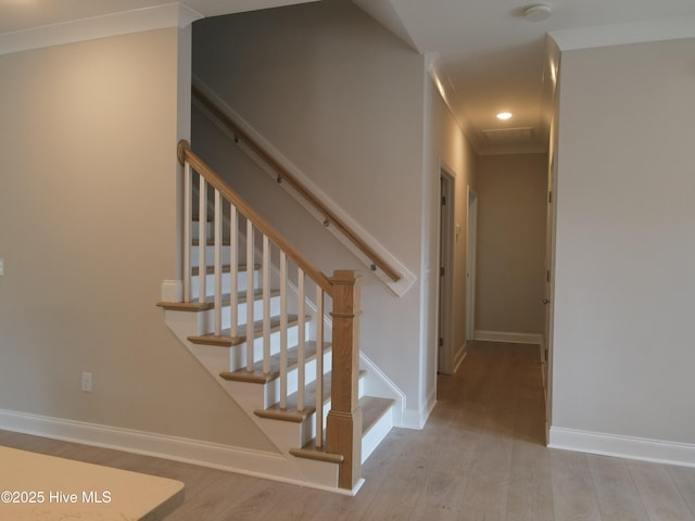 309 River Oats Ct, Holly Ridge, NC 28445 - stairs featuring wood finished floors, crown molding, and recessed lighting