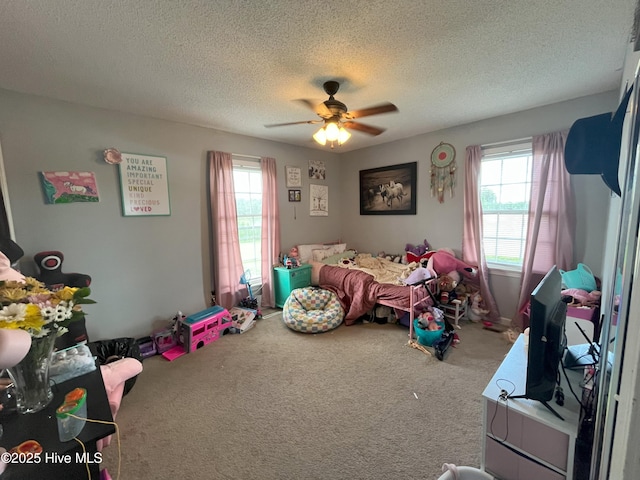1076 Corbett Town Rd, Snow Hill, NC 28580 - bedroom with carpet flooring, a textured ceiling, and ceiling fan