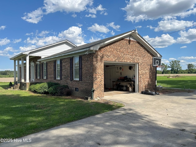 1076 Corbett Town Rd, Snow Hill, NC 28580 - view of front of property featuring an attached garage, brick siding, a front yard, and driveway