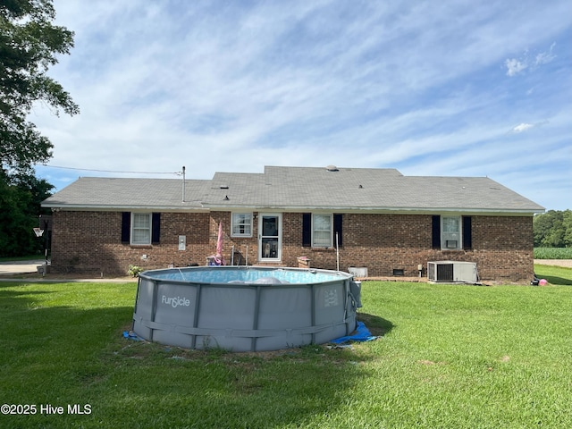 1076 Corbett Town Rd, Snow Hill, NC 28580 - rear view of house with brick siding and a yard
