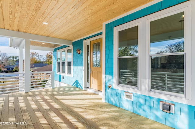 110 Dow Rd N, Carolina Beach, NC 28428 - view of wooden porch