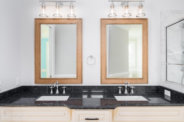 110 Dow Rd N, Carolina Beach, NC 28428 - full bathroom featuring double vanity and a shower with shower door