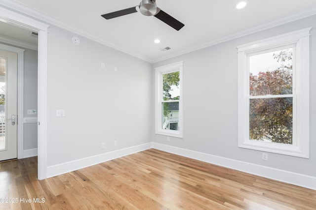 110 Dow Rd N, Carolina Beach, NC 28428 - spare room featuring a ceiling fan, light wood finished floors, baseboards, crown molding, and recessed lighting
