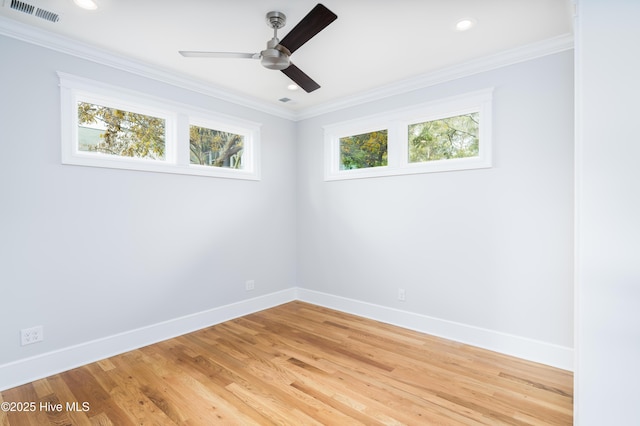 110 Dow Rd N, Carolina Beach, NC 28428 - unfurnished room with healthy amount of natural light, baseboards, crown molding, and recessed lighting