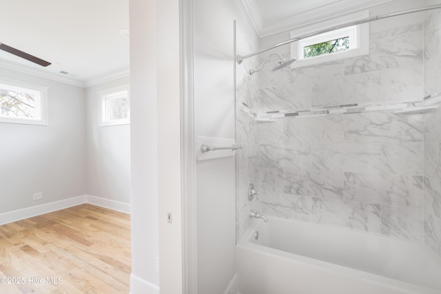 110 Dow Rd N, Carolina Beach, NC 28428 - full bath featuring ornamental molding, shower / bath combination, wood finished floors, and baseboards