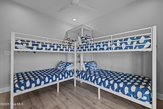 1905 Emerald Dr, Emerald Isle, NC 28594 - bedroom with wood finished floors, ceiling fan, and baseboards